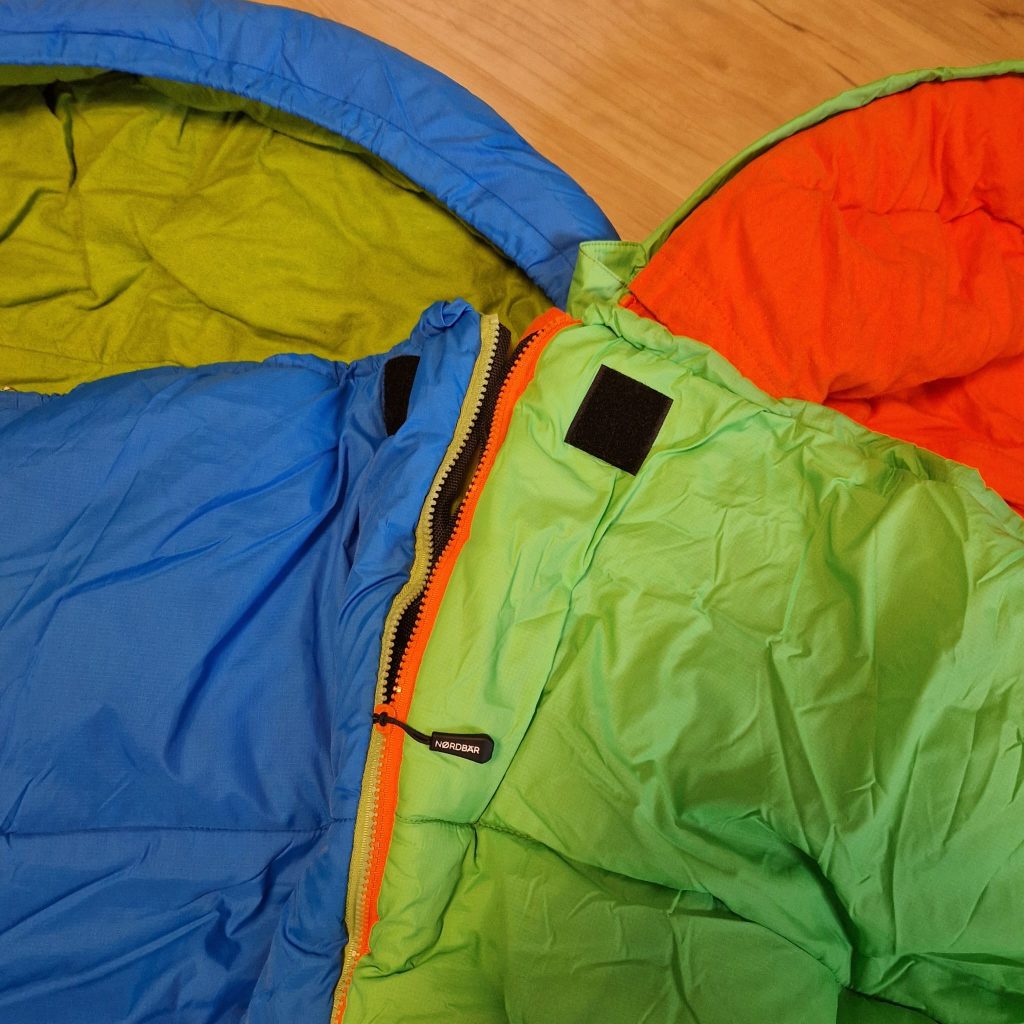 Children's sleeping bag coupling function